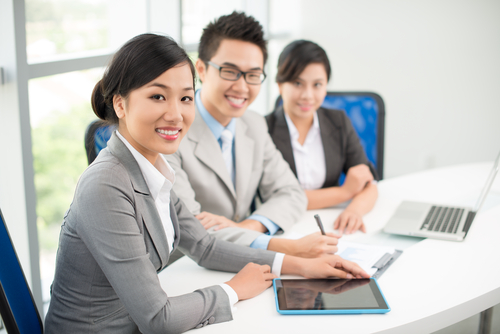Three,Young,Business,Colleagues,Sitting,In,Office,During,Meeting